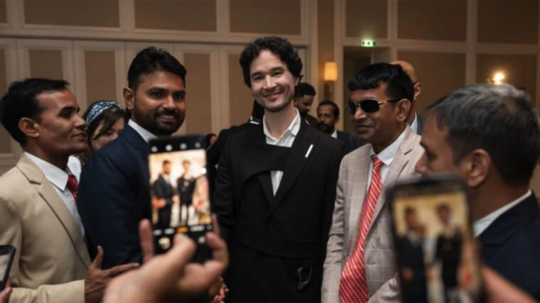 Lado Okhotnikov, center, pictured in a since-deleted Instagram post from a June 2024 event where he was promoting Meta Force to potential investors.